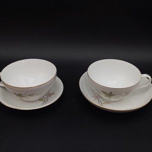 Two Economy Tea Cups and Saucers